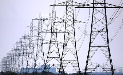 Relaxing planning rules to allow an expansion of Britain's power grid is one potential measure that would not involve spending billions. EPA