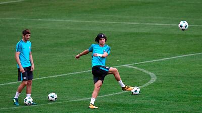 Chelsea defender David Luiz, right, and Alvaro Morata take part in training. Javier Soriano / AFP