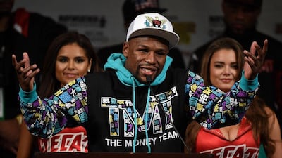 Floyd Mayweather reitres from boxing with a perfect 49-0 record, matched only by heavyweight great Rocky Marciano. Ethan Miller / Getty