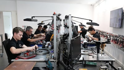 A team of experts polishing diamonds