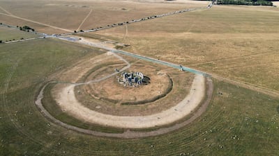 This aerial image shows the scorched grass surrounding the area at Stonehenge near Amesbury, Wiltshire in south-west England. AFP