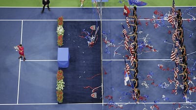 Stan Wawrinka holds up the championship trophy after beating Novak Djokovic. Julie Jacobson / AP Photo