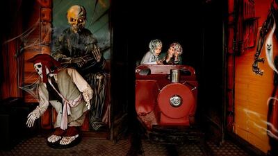 UK. London. 2011. Ghost train and its passengers during a Community Fair.