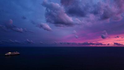 A cruise ship sails in front on the French riviera of Nice. AFP