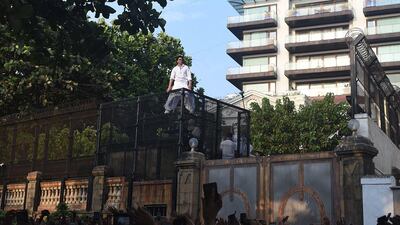 Hundreds of fans can be seen gathered outside his home on June 5. AFP