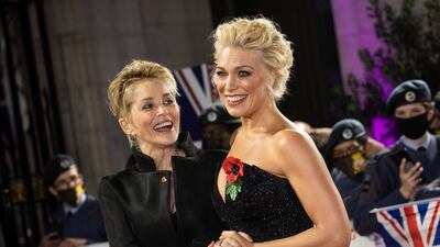 Sharon Stone, left, and Hannah Waddingham pose for photographers upon arrival at the Pride of Britain Awards on Saturday, Oct. 30, 2021 in London. (Photo by Vianney Le Caer / Invision / AP)