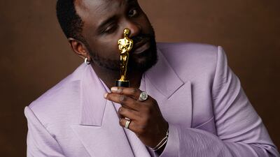 Brian Tyree Henry with a miniature Oscar statuette. AP