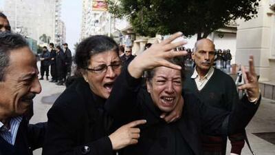 Worshippers returned to the church in Egypt today where 21 people were killed in an apparent suicide bombing.