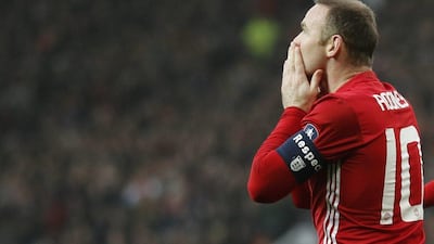 Wayne Rooney equalled Bobby Charlton's Manchester United goal-scoring record with the first goal in a 40 FA Cup victory against Reading on Saturday. Darren Staples / Reuters