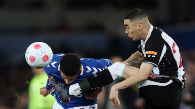 Newcastle's Miguel Almiron and Ben Godfrey battle for ball. Reuters
