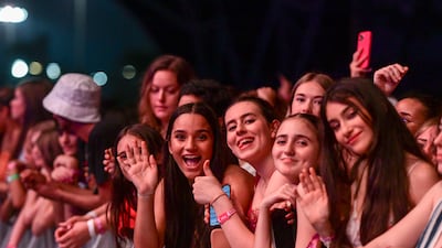 Fans cheer as Usher performs
