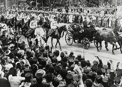 a crowd welcomes the new king, Farouk, on his return to Cairo from England after the death of his father in 1936. Shutterstock