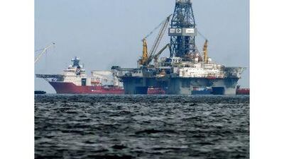 Aker's ships and relief well rigs work above the sunken Deepwater Horizon oil rig in the Gulf of Mexico to contain the spill.