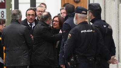 Catalan politician Jordi Turull embraces his wife Blanca Bragulat as he arrives to the Supreme Court after being summoned and facing investigation for his part in Catalonia's bid for independence in Madrid, Spain. Susana Vera/ Reuters