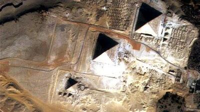 The Emirates Institution for Advanced Science and Technology dedicated this image of the Great Pyramids to the Egyptian people. Courtesy EIAST
