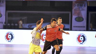 Deco, centre, in action for Telugu in Premier Futsal. Courtesy Premier Futsal