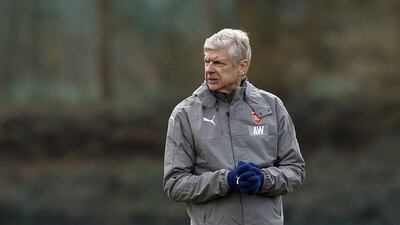 Arsenal manager Arsene Wenger during training ahead of the Uefa Champions League tie against Bayern Munich. Andrew Couldridge / Reuters