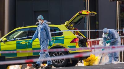 Police forensic officers working near the crime scene at London Bridge in London, Britain, November 30, 2019. ISIS claimed responsibility for the attack. EPA/VICKIE FLORES