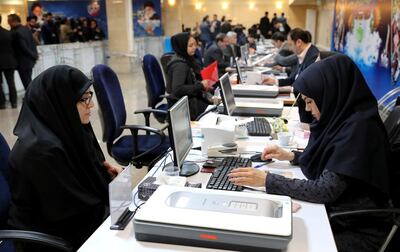 People register as candidates for parliamentary elections set for February 2020, at the interior ministry in Tehran, Iran, Sunday, Dec. 1, 2019. AP