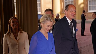 President of the European Commission Ursula von der Leyen and her husband Heiko arrive at the reception. PA