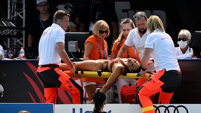 Anita Alvarez receives medical attention after fainting during the World Aquatics Championships. AP