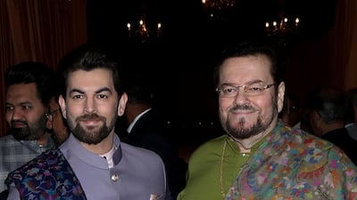 Actor Neil Mukesh (L) with his father, singer Nitin Mukesh