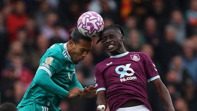 Liverpool's Virgil van Dijk and Loum Tchaouna of Burnley challenge for a header. Reuters