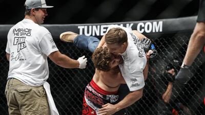 The One Fighting Championship "Reign Of Champions" mixed martial arts tournament held at the Dubai World Trade Center. Ben Askren celebrates after beating Nobutatsu Suzuki in the first round of the Welterweight World Championship. Antonie Robertson / The National