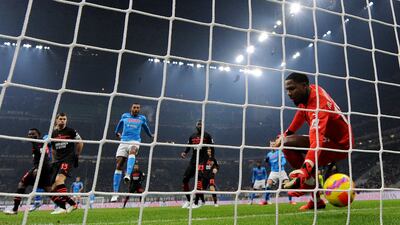 Eljif Elmas' header crosses the line to give Napoli the lead against AC Milan. Reuters