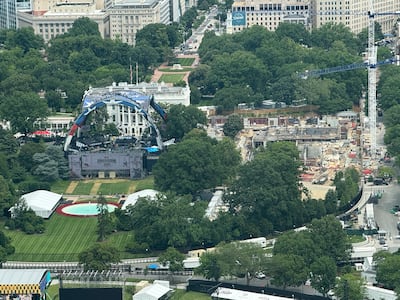 A view of the White House from the top of the Washington Monument shows the arena on the South Lawn and the ruins of the East Wing. Thomas Watkins / The National