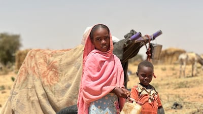 Children among hundreds of people fleeing from the Zamzam displacement camp near El Fasher, Sudan, in 2025. EPA