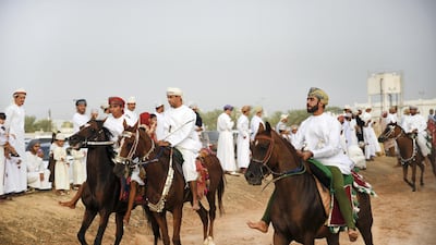 On top of mounds that serve as impromptu bleachers, hundreds of people from every part of Oman’s Ash Sharqiyah North Governorate have gathered. Courtesy David Ismael.