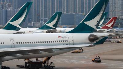 Cathay Pacific Airways planes park at the Hong Kong International Airport. AP
