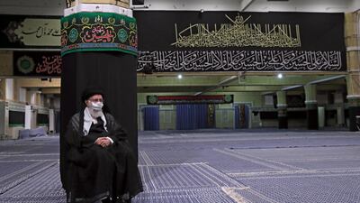 Iranian Supreme Leader Ayatollah Ali Khamenei wearing a protective face mask as he listens to a reciting of the Quran and a speaker at the empty mosque in his residence compound during the holy month of Muharram, ahead of Ashura day, in Tehran, Iran. EPA