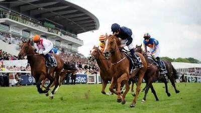Jockey Ryan Moore rode Ruler of the World to victory at the Espom Derby and was followed in by Libertarian on June 1. Adrian Dennis / AFP