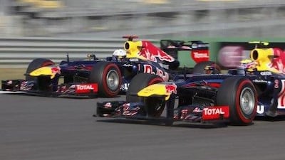 Red Bull Formula One drivers Sebastian Vettel, left, and Mark Webber during a practice session at the Korea International Circuit in the Yeongam province. Woohae Cho / Reuters