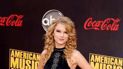 Taylor Swift, in an embellished LBD, arrives at the American Music Awards in Los Angeles, California, on November 18, 2007. EPA
