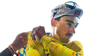 US rider Brandon McNulty with the yellow jersey after winning the Volta Valenciana. EPA