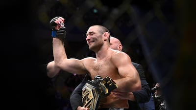 Sean Strickland gets the UFC middleweight belt placed around his waist after defeating Israel Adesanya at UFC 293. EPA