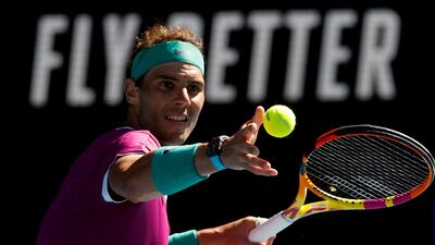 Spain's Rafael Nadal hits the ball into the stands to celebrate after winning the match against Marcos Giron of the US. AFP