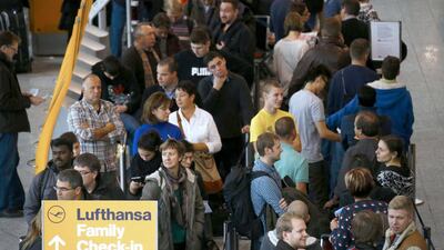 Passengers wait in a queue at the Frankfurt airport during a Lufthansa pilots’ strike. The German carrier cancelled 1,350 flights, affecting 150,000 passengers. Kai Pfaffenbach / Reuters