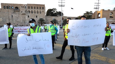 Libyan activists in Tripoli's Martyrs Square demonstrate against the postponement of presidential elections. AFP