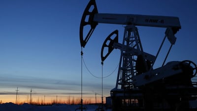 Pump jacks are seen at an oilfield outside the West Siberian city of Kogalym, Russia. Oil executives are meeting to discuss the industry. Sergei Karpukhin / Reuters