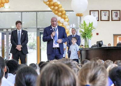 Headteacher Mark Leppard addresses pupils as British School Al Khubairat starts a year-long party to mark its 50th anniversary. Victor Besa / The National