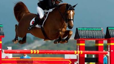 Sheikha Latifa Al Maktoum, riding Kalaska De Semily, on her way to silver during the Asian Games in Guangzhou yesterday.