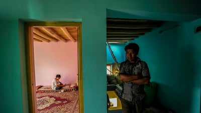 Mr Dorjey and Rigzen in their home.