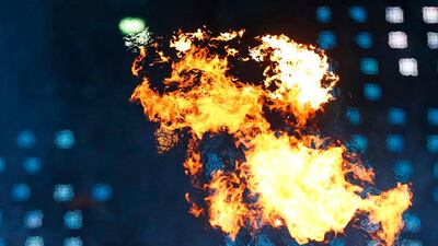 A member of the cast performs with fire during the Opening Ceremony for the 2012 Paralympics. Matt Dunham/AP