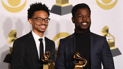 Dwan Hill and Alvin Love III, winners of Best Gospel Performance/Song for 'Never Have To Be Alone' pose in the press room. AFP