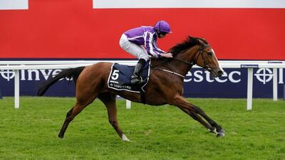 Ryan Moore and Minding overcame traffic problems to run out clear winners in the Investec English Oaks race at the Epsom meeting. Henry Browne / Action Images