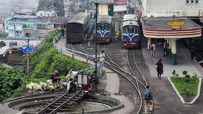 Darjeeling Himalayan Railway trains are seen at a station in Darjeeling.